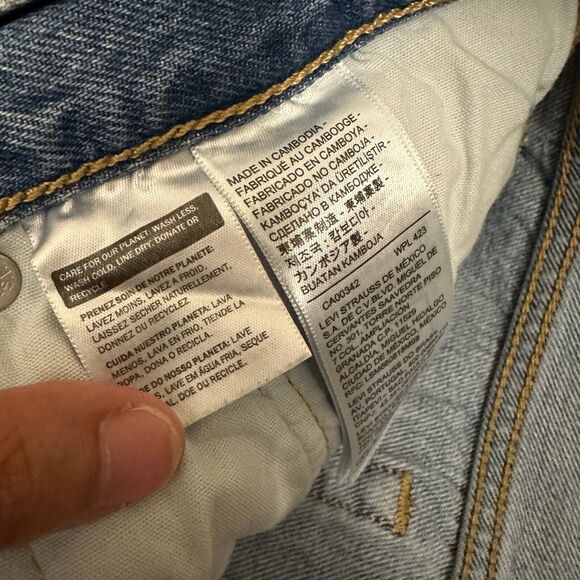 LEVI'S 501 High Waist Button Fly Distressed Jean Shorts in Blue - Picture 9 of 12